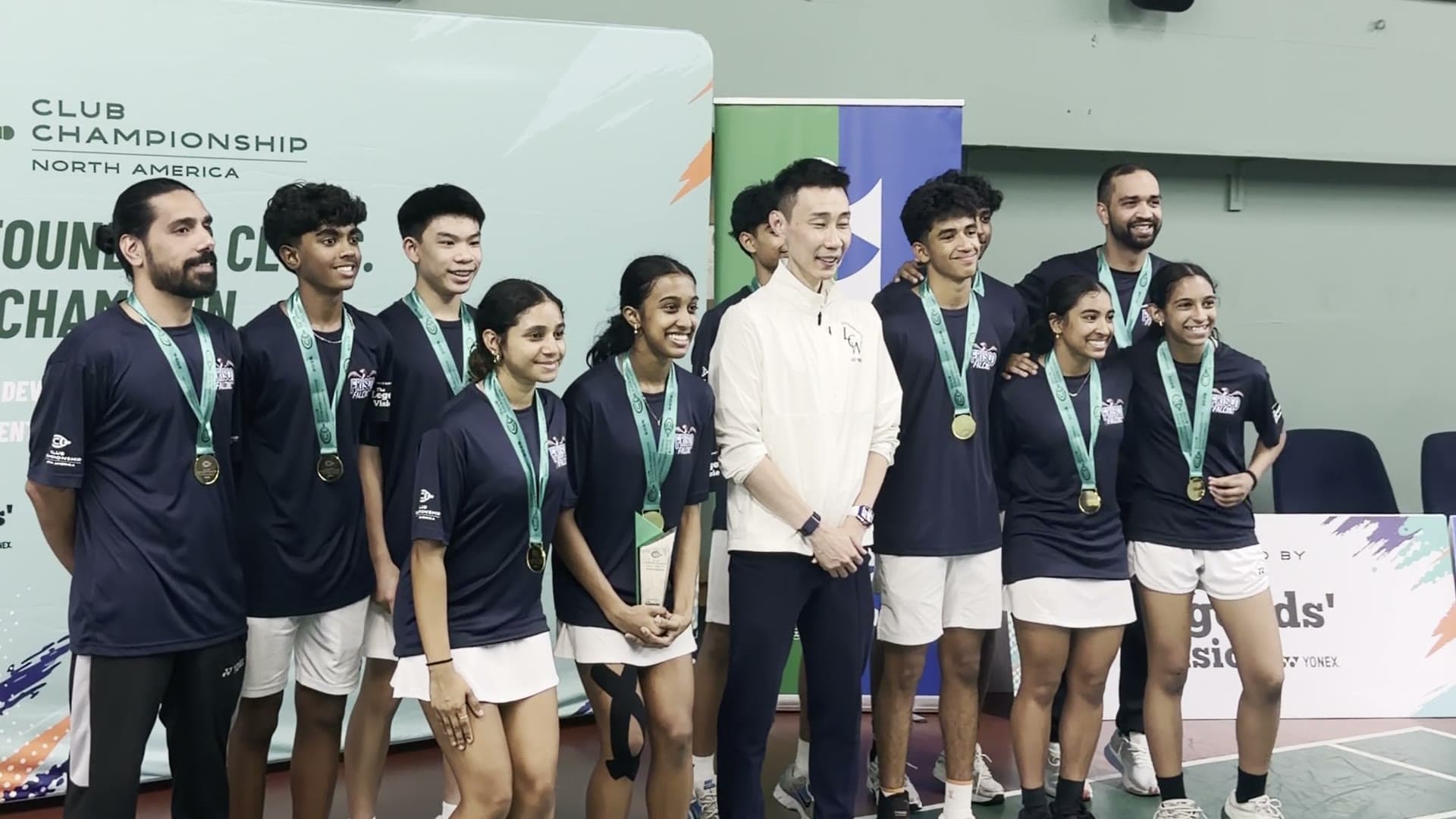 The Frisco Falcons wearing their gold medals alongside Lee Chong Wei at the Club Championship North America medal ceremony